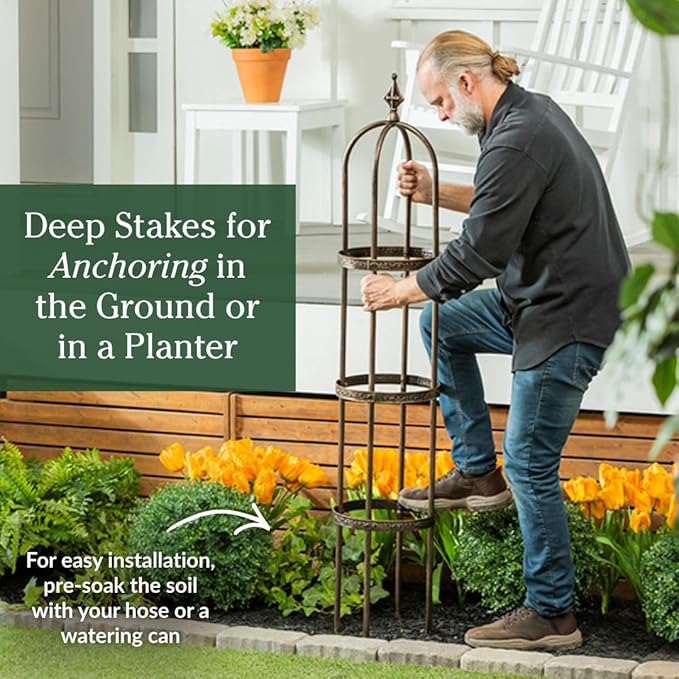 Plow &amp Hearth Metal Garden Plant Obelisk | Indoor &amp Outdoor Safe | Powder-Coated Steel Cast Iron Finial | Trellis for Climbing Planters | Stamped Floral Pattern | 14 Dia. x 8'H (Antique Coppe
