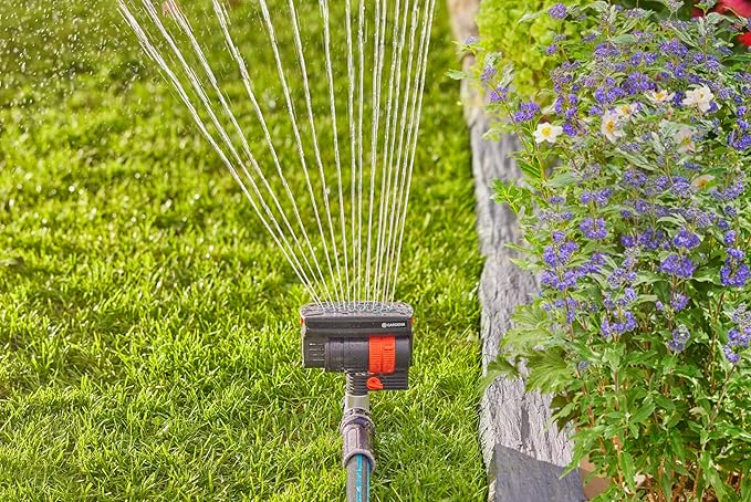 GARDENA 20575 | Up to 2300 sq ft - ZoomMaxx Adjustable Oscillating Sprinkler on Metal Step Spike for Watering Large Area Lawn with US Hose Threads Yard and Garden. Gardena Quick Connects
